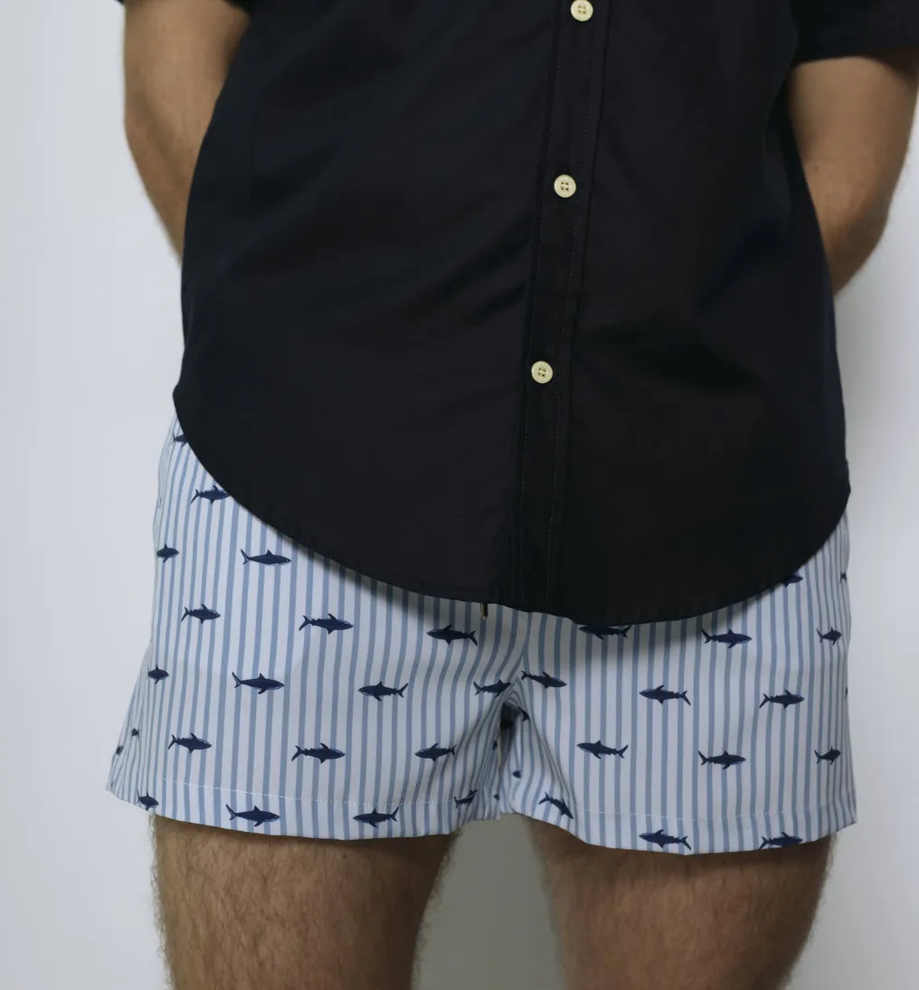 SHORT DE BAÑO LIBERATO CELESTE RAYADO TIBURONES