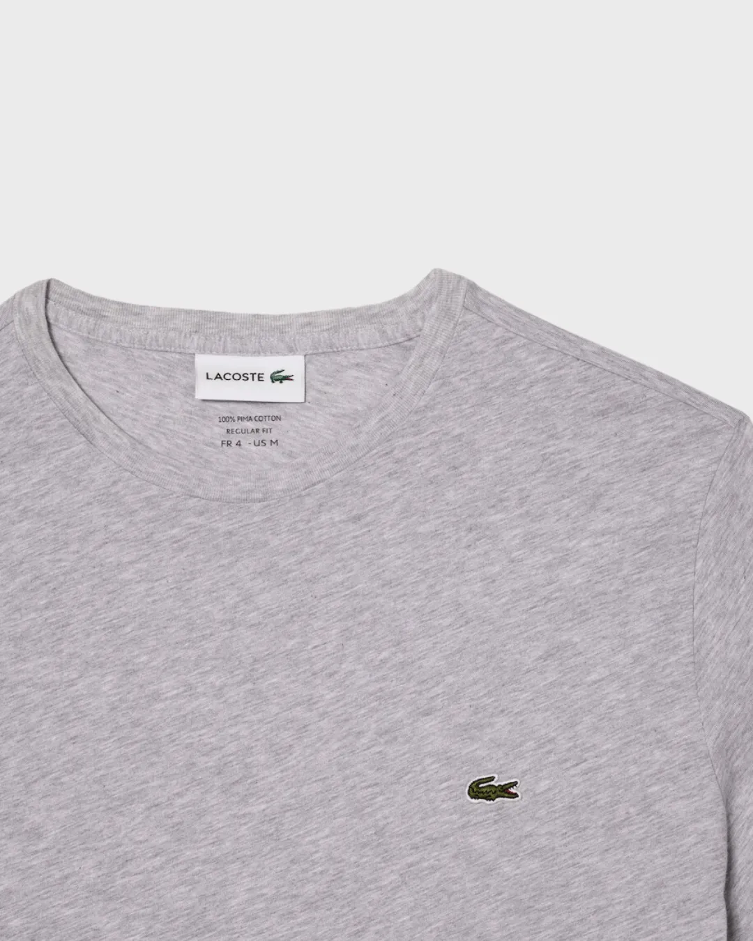 REMERA CUELLO REDONDO LACOSTE GRIS