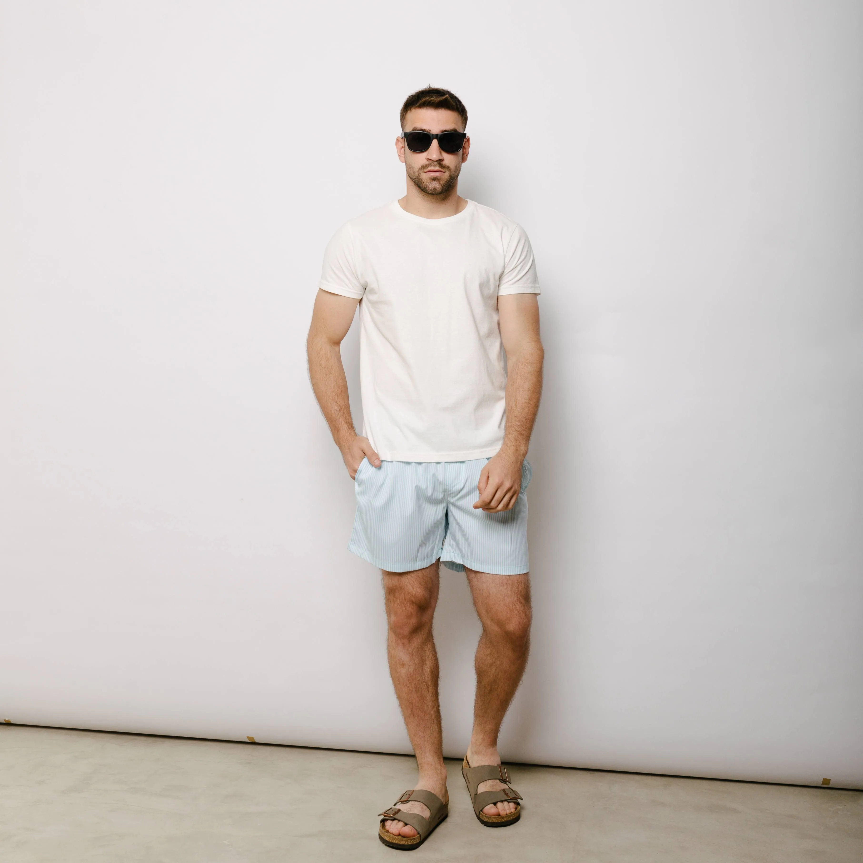 SHORT DE BAÑO LIBERATO BASICS RAYAS CELESTE