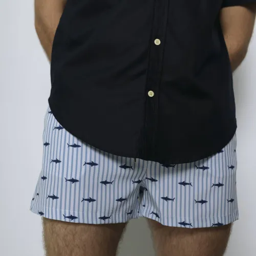 SHORT DE BAÑO LIBERATO CELESTE RAYADO TIBURONES